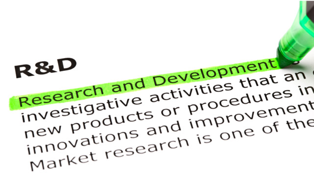 a green marker is highlighting the word research and development