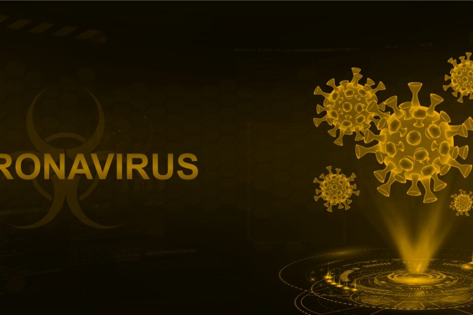 the word coronavirus that on a black background with gold molecules