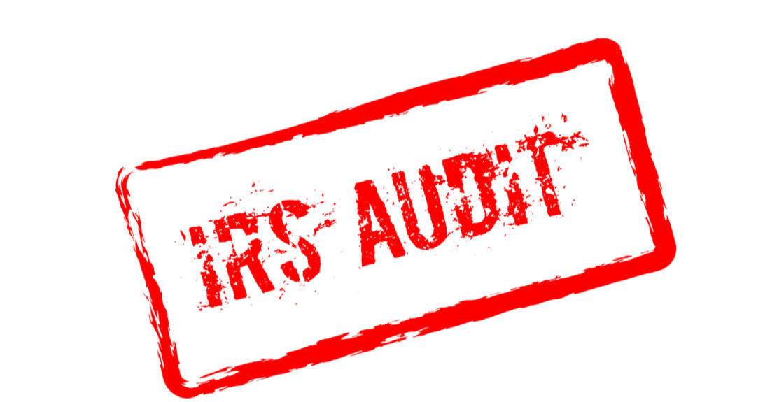 a red stamp that says IRS Audit on it