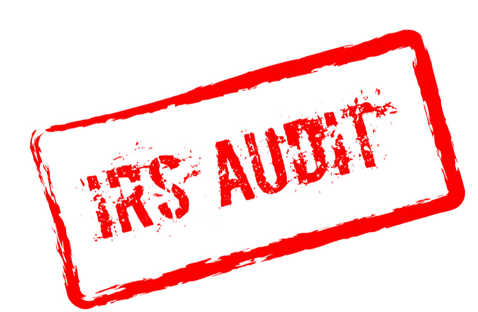a red stamp that says IRS Audit on it